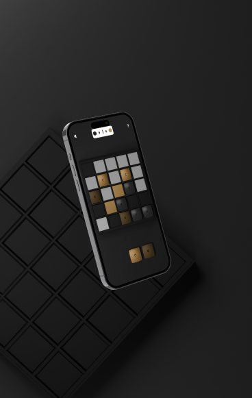 Motif on a phone next to the black board